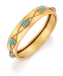 A VICTORIAN TURQUOISE BANGLE, eight raised oval reserves se