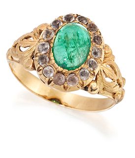 AN EMERALD AND PASTE CLUSTER RING, an oval-cabochon emerald