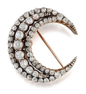 A VICTORIAN DIAMOND CRESCENT BROOCH, as three rows of old-c