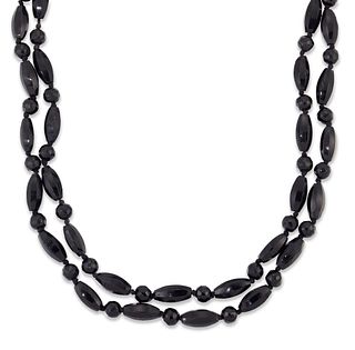A FRENCH JET GLASS BEAD NECKLACE, as a continuous length of