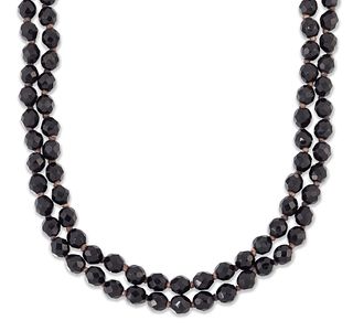 A FRENCH JET GLASS BEAD NECKLACE, of faceted round beads kn