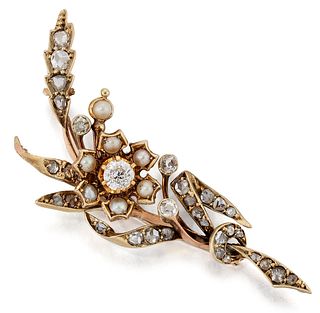 A LATE 19TH CENTURY DIAMOND AND SEED PEARL BROOCH, a centra