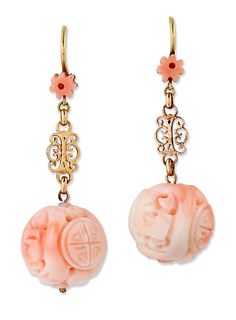 A PAIR OF CHINESE CORAL EARRINGS, each carved pink coral fl