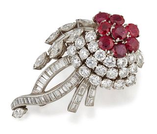 A RUBY AND DIAMOND BROOCH, a cluster of round-cut rubies in