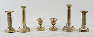 Three Sets of Brass Candlesticks