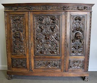 Antique Highly Carved Continental Cabinet.
