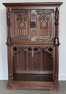Gothic Style Figural Carved Oak Cabinet.