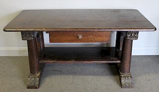 Antique Library Desk with Carved Faces.