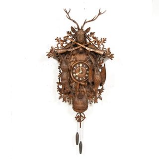 20TH C. OVERSIZED BLACK FOREST CARVED CUCKOO CLOCK