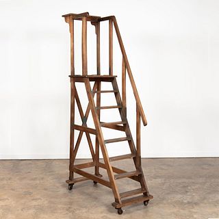 E. 20TH C. ROLLING WOODEN LIBRARY LADDER