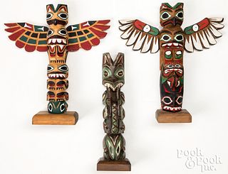 3 Northwest Coast carved and painted totem poles