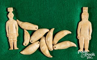 Inuit carved bone figures & drilled sea lion teeth