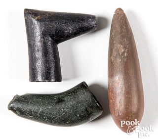 Three stone artifacts, to include two pipe bowls