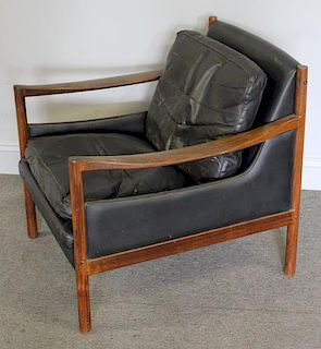 Midcentury Rosewood and Leather Lounge Chair.