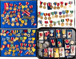 Large group of US military medals and ribbons