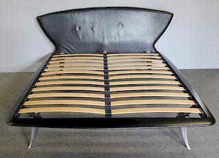 Modernist Black Leather Upholstered Bed.