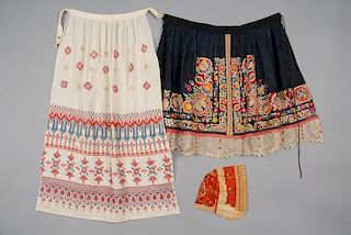 TWO ETHNIC EMBROIDERED COTTON APRONS, MID 20th C.