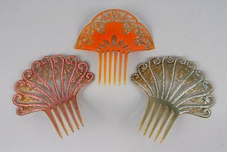 THREE LARGE PIERCED CELLULOID HAIR COMBS, EARLY 20th C.