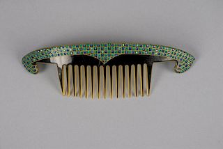 AN UNUSUAL CELLULOID HAIR COMB, EARLY 20th C.