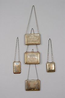 FIVE STERLING SILVER PURSES and COMPACTS, 1910s - 1930s.