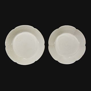 An associated pair of Chinese whiteware floriform dishes Song dynasty