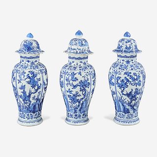 Three Chinese blue and white porcelain baluster vases and covers Kangxi period