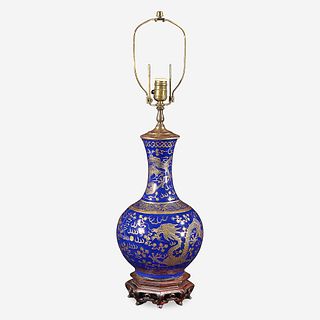 A Chinese gilt-decorated cobalt blue porcelain “Dragon” bottle vase, mounted as a lamp