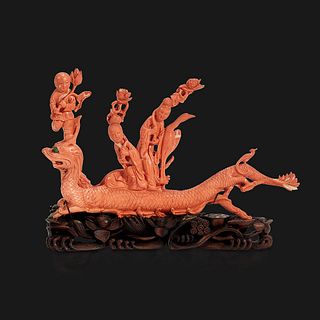 A Chinese carved coral "Dragon, Boy, and Meiren" group