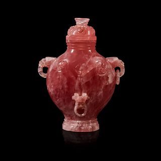 A Chinese carved rose quartz archaistic vase and cover