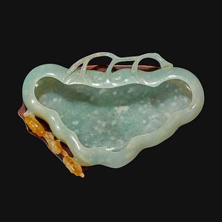 A Chinese carved pale greenish-white and russet jadeite brush washer