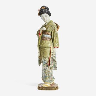 A Japanese enameled Satsuma-type pottery figure of a bijin, Kinkozan studios late 19th/early 20th Century