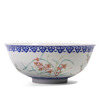 A CHINESE FAMILLE-ROSE ‘FLORAL' BOWL