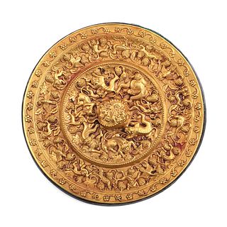 A CHINESE COPPER-INLAID ‘MYTHICAL BEAST’GOLD MIRROR
