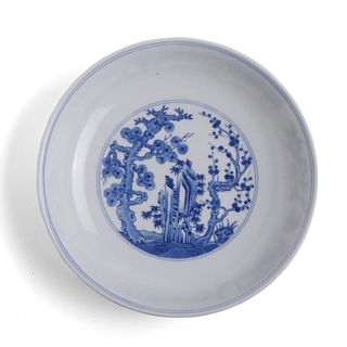 A BLUE AND WHITE ‘PINE, BAMBOO AND PLUM’ DISH