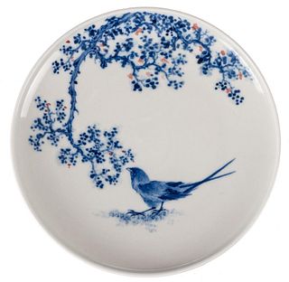 A CHINESE BLUE AND WHITE ‘FLORAL AND BIRD’ DISH