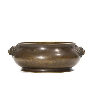 A CHINESE BRONZE CENSER WITH BEAST HANDLES