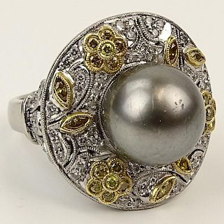 Lady's 11.3mm Black Pearl, Yellow and White Diamond and Platinum Filigree Ring.