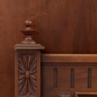 Cama matrimonial. Francia. Siglo XX. Estilo Enrique II. En talla de madera de nogal. Consta de: cabecera, piecera y 2 largueros.