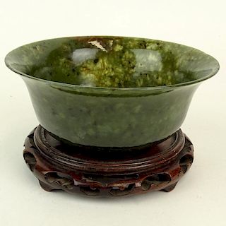 Early to Mid 20th Century Chinese Carved Jade Bowl with Carved Wood Base.