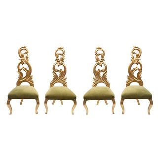 Lote de 4 sillas. Mexico. S XX. Elaboradas en madera tallada y dorada. Con respaldos altos a manera de rocallas y tapicería de tela