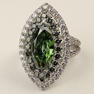 Lady's Large Marquise Cut Enhanced Green Diamond, Round Cut Green and White Diamond and 18 Karat White Gold Ring