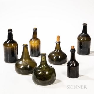 Seven Early Blown Glass Bottles