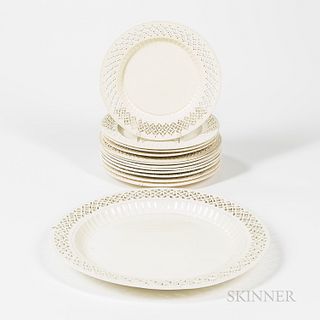 Twelve Reticulated Creamware Plates and a Charger