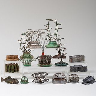 A Group of Eighteen Wire, Cast Iron and Metal Flower Frogs