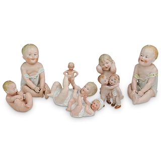 (8Pc) Porcelain Baby Figurine Lot