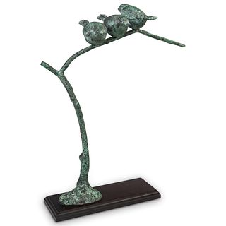 Bronze Birds Perched On Branch