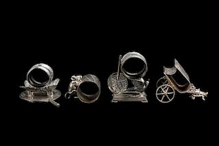 Group of 4 Silver Plate Figural Napkin Rings