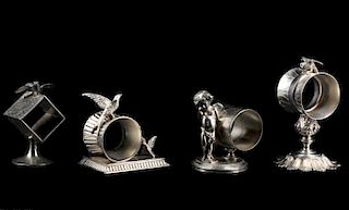 Collection of 4 Silverplate Figural Napkin Rings