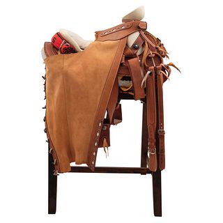 FAENA CHARRO SADDLE  MEXICO, 20TH CENTURY Smooth "duck tail" skeleton chair with "Silao" type shaft