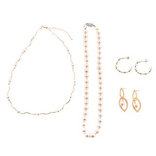 A Collection of Pearl Jewelry in Gold